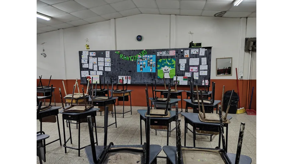 Classroom blackboard decorated with educational posters and student work under the Word francophonie